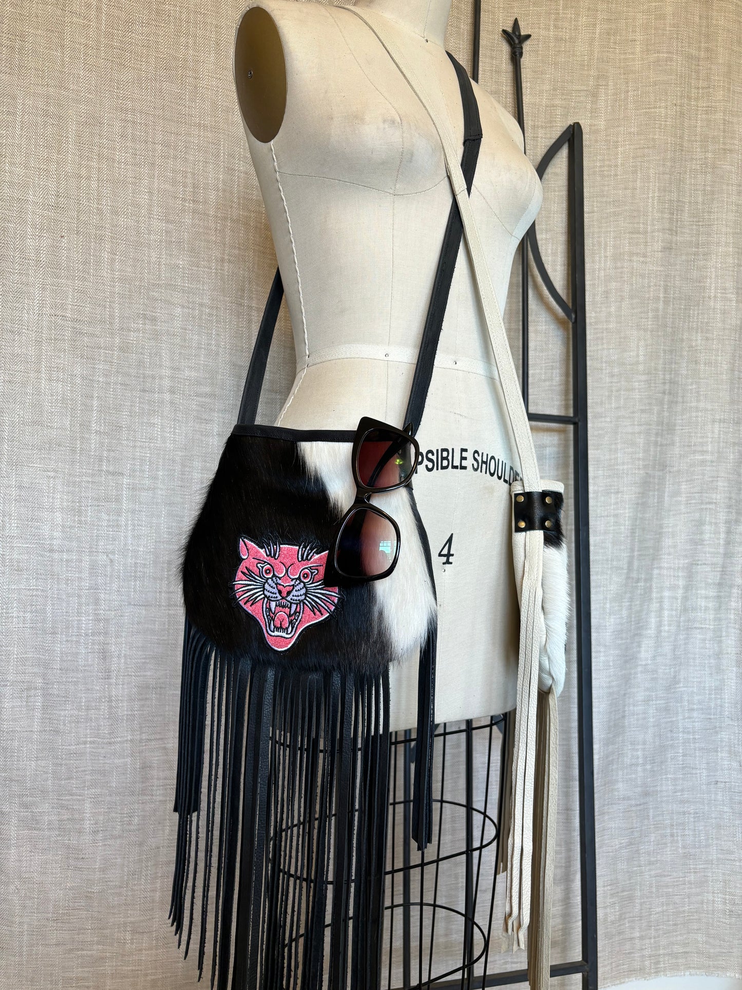 Black Cowhide with Pink Panther Fringed Crossbody