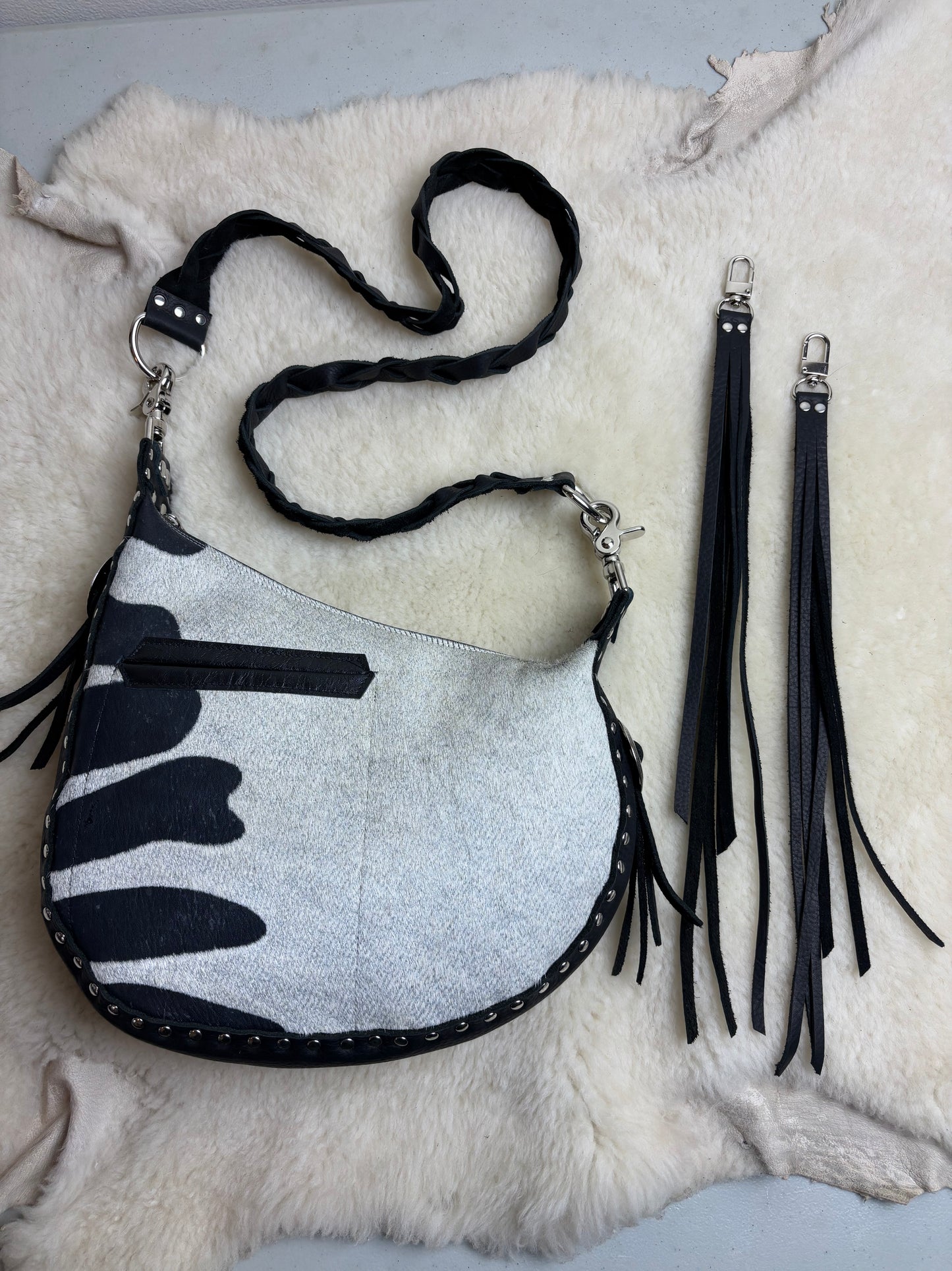 Zebra Crescent Bag with Conchos