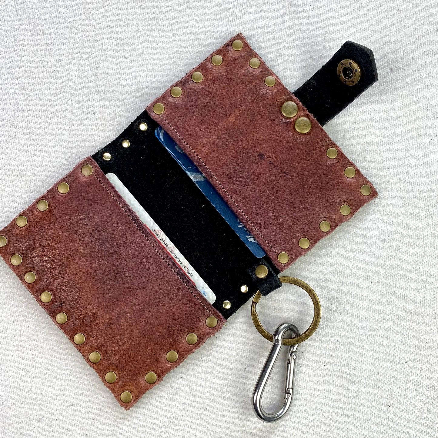 Black Wallet with Oxblood Bolts
